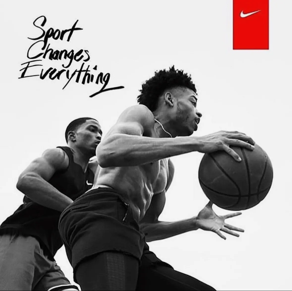 Sport Changes Everything, a black and white Nike print ad of two players driving to the basket